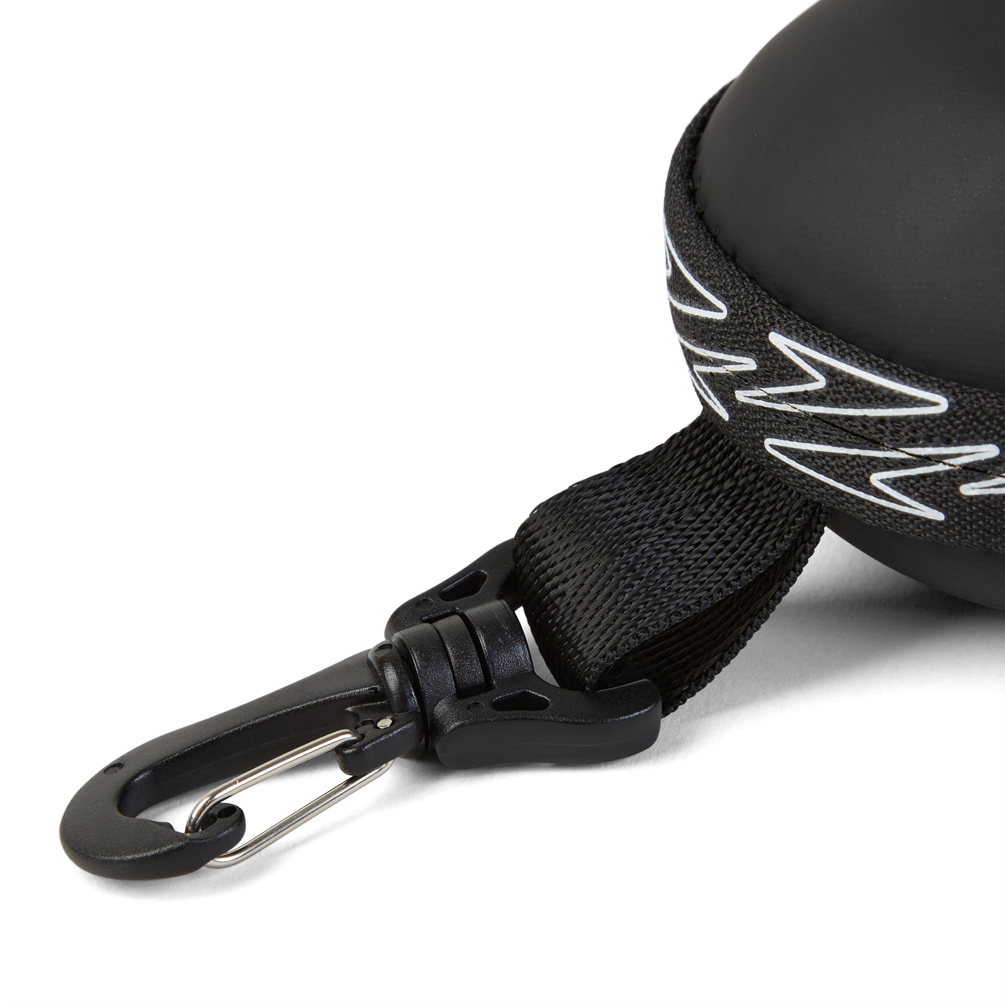 Close-up of a black plastic clip on a sturdy strap attached to the Speedo Goggle Case - Black, a round protective case by Speedo, featuring a white zigzag edge for superior storage of your goggles.