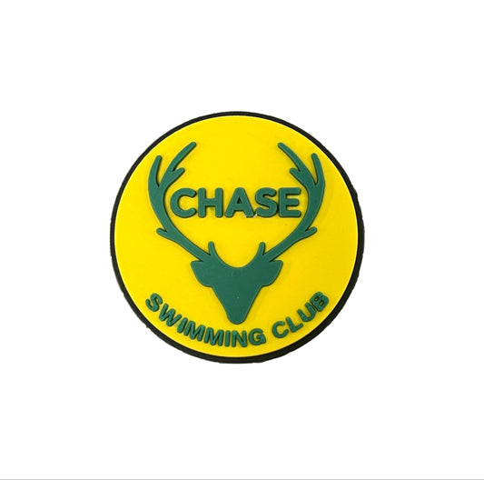 The All4Swim Chase Swimming Club Shoe Charm - Yellow features a round yellow badge with green deer antlers, “CHASE” in green above, and “SWIMMING CLUB” in green along the bottom—perfect as a swimming-themed shoe accessory.