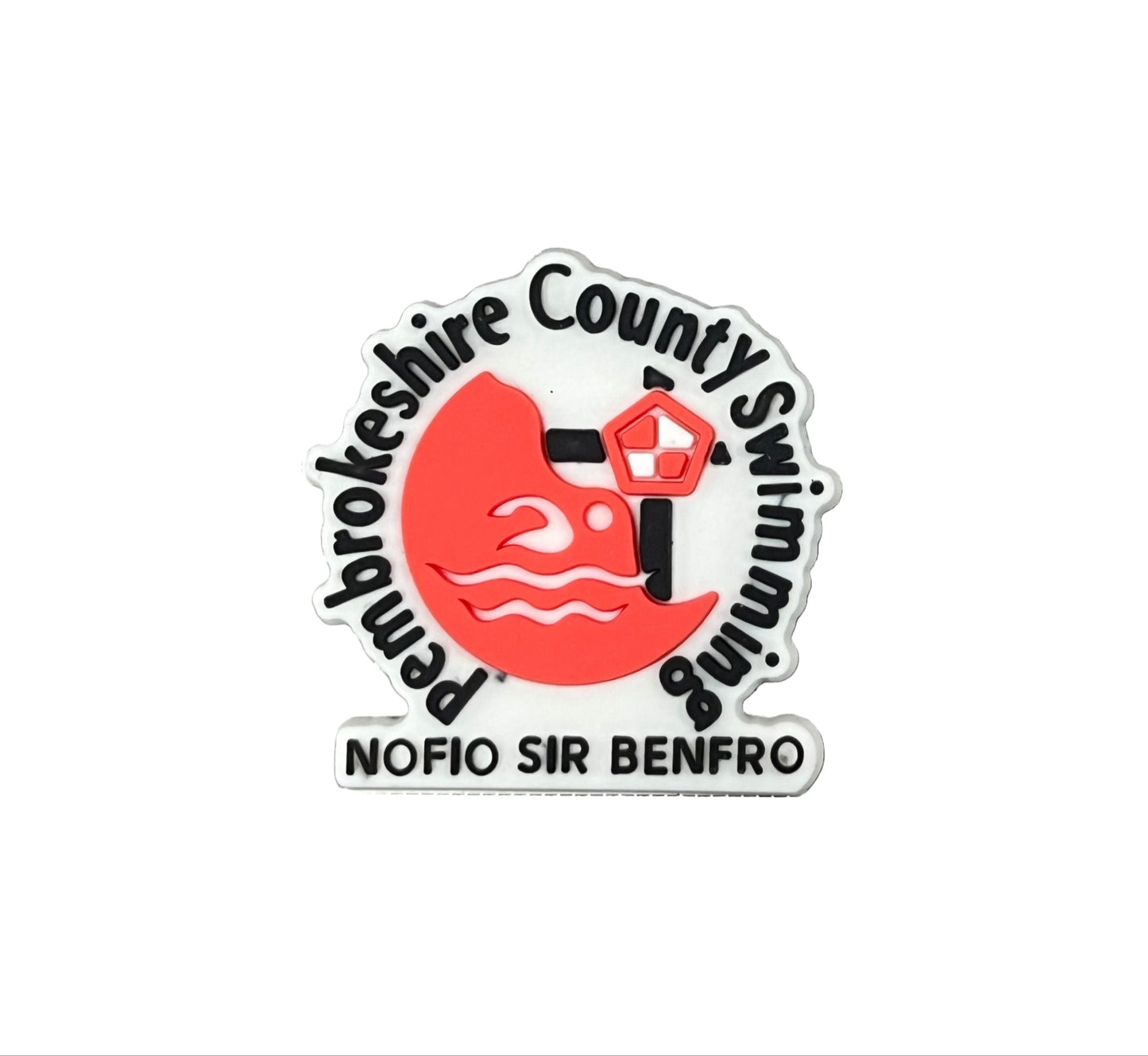 The Pembrokeshire County Swimming Shoe Charm by All4Swim features a red swimmer, waves, and lifeguard hut with "Pembrokeshire County Swimming" and "NOFIO SIR BENFRO" text—a perfect poolside accessory.